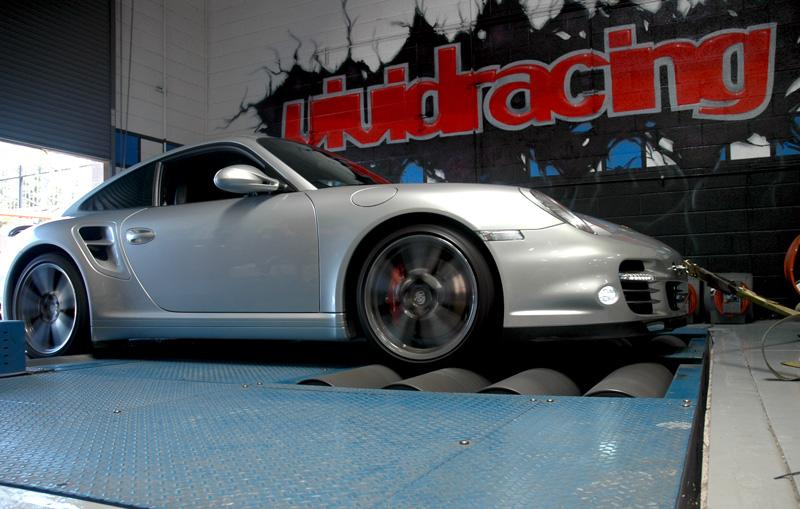 <p>Porsche 997.2 Turbo Dyno</p><br /><div class="wdm_img_popup" >Share this:<br /><a title="Facebook" href="http://www.facebook.com/sharer.php?m2w&s=100&p[title]=vrt-9972-tt-1&p[summary]=vrt-9972-tt-1 Porsche+997.2+Turbo+Dyno&p[url]=http://www.vrtuned.com/wp-content/gallery/on-the-dyno/vrt-9972-tt-1.jpg&p[images][0]=http%3A%2F%2Fwww.vrtuned.com%2Ftuning%2Fwp-content%2Fgallery%2Fon-the-dyno%2Fvrt-9972-tt-1.jpg" target="_blank"><img src="http://www.vrtuned.com/wp-content/plugins/sharemygallery/images/facebook_share.jpg" alt="fshare"></a><a title="Twitter" href="http://twitter.com/share?url=http://www.vrtuned.com/wp-content/gallery/on-the-dyno/vrt-9972-tt-1.jpg&text=vrt-9972-tt-1+Porsche+997.2+Turbo+Dyno+" target="_blank"><img src="http://www.vrtuned.com/wp-content/plugins/sharemygallery/images/twitter_share.png" alt="tweet"></a><a title="Google Plus" href="https://plus.google.com/share?url=http://www.vrtuned.com/wp-content/gallery/on-the-dyno/vrt-9972-tt-1.jpg" target="_blank"><img src="http://www.vrtuned.com/wp-content/plugins/sharemygallery/images/google_share.png" alt="gplus"></a><a title="Pinterest" href="http://pinterest.com/pin/create/button/?url=http://www.vrtuned.com/wp-content/gallery/on-the-dyno/vrt-9972-tt-1.jpg&media=http://www.vrtuned.com/wp-content/gallery/on-the-dyno/vrt-9972-tt-1.jpg&description=vrt-9972-tt-1Porsche+997.2+Turbo+Dyno" target="_blank"><img src="http://www.vrtuned.com/wp-content/plugins/sharemygallery/images/pinterest_share.png" alt="pin"></a><a class="wdm_smg_email_image" title="Email" href="#" onclick="wdm_smg_send_email_112();"><img src="http://www.vrtuned.com/wp-content/plugins/sharemygallery/images/email-icon.png" alt="email"></a><div class="wdm_smg_load_image_112" style="display:none;padding:2px;">
		Sending <img src="http://www.vrtuned.com/wp-content/plugins/sharemygallery/images/ajax-loader-small.gif" alt="Sending...">
		</div>
		<div class="wdm_smg_sent_image_112" style="display:none;padding:2px;"> Thank you for sharing the gallery image </div>
		<script type="text/javascript">
		function wdm_smg_send_email_112()
				{
					var site_name = "VR Tuned";
					var img_url = "http://www.vrtuned.com/wp-content/gallery/on-the-dyno/vrt-9972-tt-1.jpg";
					var img_path = "/var/www/vhosts/vrtuned.com/htdocs/tuning/wp-content/gallery/on-the-dyno/vrt-9972-tt-1.jpg";
					var img_name = "vrt-9972-tt-1.jpg";
					var email_from = "tuning@vividracing.com";
					var email_sub = "Check out this from VRTuned.com";
					var email_before = "View image by clicking the link:";
					var email_after = "This link has been shared from <a href=\\\\\\\\\\\\\\\\\\\\\\\\\\\\\\\"http://www.vrtuned.com\\\\\\\\\\\\\\\\\\\\\\\\\\\\\\\">VR Tuned</a>";
					var email_ack = "Thank you for sharing the gallery image";

					var email=prompt("Send to email address:","");

					if (email!=null && email!="")
					{
						jQuery.ajax(
							{
								url:"http://www.vrtuned.com/wp-content/plugins/sharemygallery/smg_email_image.php",
								cache: false,
								data:{
									"image_name":img_name,
									"image_path":img_path,
									"smg_site":site_name,
									"smg_image":img_url,
									"smg_email":email,
									"smg_email_from":email_from,
									"smg_email_sub":email_sub,
									"smg_email_before":email_before,
									"smg_email_after":email_after,
									"smg_email_ack":email_ack
								},
								type:"POST",
								beforeSend: function(){
								jQuery.blockUI({ css: { 
								padding: "10px", 
								backgroundColor: "#999", 
								"-webkit-border-radius": "5px", 
								"border-radius": "5px",  
								color: "#fff",
								width:"15%",
								left:"42%"
								},
								message: "<div class=\"gal_img_sending_stat\" style=\"font-weight:bold;\">Sending...<br /><br /><img src=\"http://www.vrtuned.com/wp-content/plugins/sharemygallery/images/ajax-loader.gif\" alt=\"Sending...\" /></div>"});
								jQuery(".wdm_smg_load_image_112").show();
								 },
								 complete: function(){
								 jQuery.unblockUI();
								 jQuery(".wdm_smg_load_image_112").hide();
								},
								success: function(data){
								apprise(data);
								 }
							}
							);
					}
				}
		</script></div>